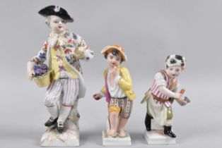 A Pair of KPM Porcelain Figures, 10.5cms High together with a Larger Example (AF)