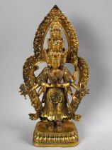 A Reproduction Tibetan Gilt Bronze and Jewelled Study of Buddha, 28cms High