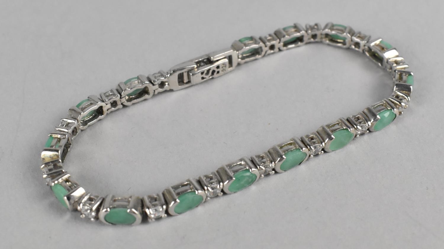 A Silver and Aventurine and White Stone Tennis Bracelet