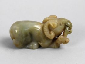 A Reproduction Chinese Hardstone Carving of a Goat, 8cms Wide