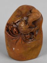 A Reproduction Chinese Soapstone Effect Seal, Carved with Fish, 7cms High