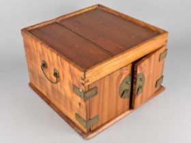 A Chinese Camphor Wood Travelling Chest, Two Door Front Revealing Two Short and One Long Drawer,