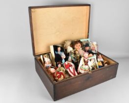 A Vintage Wooden Box containing Various Vintage Souvenir Dolls
