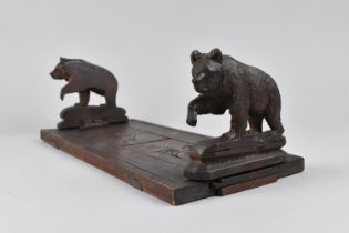 A Pair of Black Forest Type Folding Bookends with Bear Supports, 31cms Wide