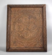A Carved Oak Panel with Floral and Geometric Design, 56cms Wide