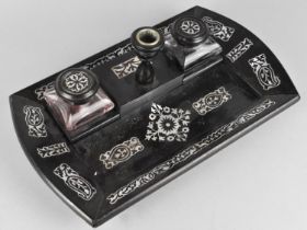 A Victorian Mother of Pearl Inlaid Ebonized Desk Top Inkstand with Grooved Pen Store, Two Glass