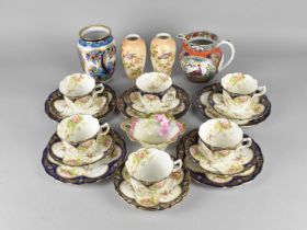 An Edwardian Blue Inset Trim and Floral Decorated Tea Set together with a Hand Painted Continental