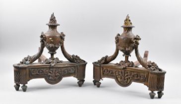 A Pair of Late 19th/Early 20th Century Fire Dogs in the Empire Style, Cast with Flaming Urns Adorned