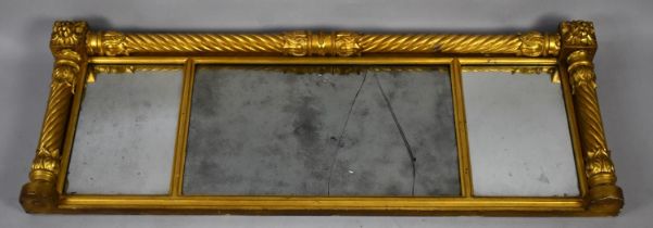 A 19th Century Regency Gilt Wooden Gesso Triptych Overmantle Mirror having Moulded Wrythen