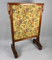 A Victorian Walnut Framed Country House Firescreen, Having a Fruit and Foliate Needlework Panel,