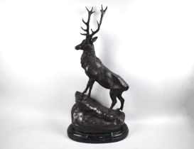 A Very Large and Heavy Bronze Study of a Stag on Rock after Moigniez on Oval Stepped Marble Base,