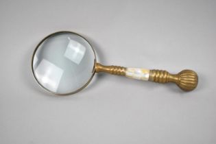 A Large Desktop Magnifying Glass with Brass and Mother of Pearl Handle, 25.5cs Long