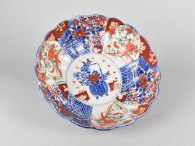 A Japanese Porcelain Bowl with Scalloped Edge, 21.5cms Diameter