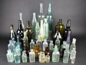 A Collection of Various Glass Bottles, Pots etc