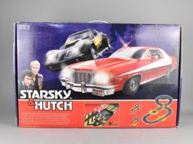 A Boxed Starsky and Hutch Scalextric Slot Game Set Made for Marks and Spencers