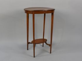 A Mahogany Banded Oval Topped Occasional Table with Straight Square Supports, Bottom Stretcher