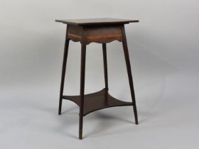 A Mahogany Banded Square Topped Occasional Table on Tapering Supports with Stretcher Shelf, 27cms