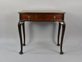 A Mahogany Side Table on Shell Moulded Cabriole Supports Having Single Long Drawer, 76x48x51.5cms