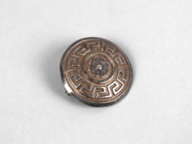 An Early 20th Century Toujours Fidele Brooch of Circular Form Decorated with Greek Key and Central