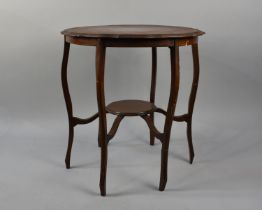 An Octagonal Topped Occasional Table on Hexagonal Supports with Central Stretcher Shelf, 75cms High