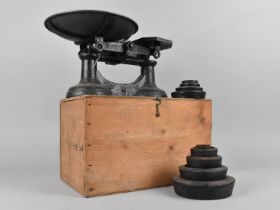 A Cast Iron Pan Scale with Weights in Box