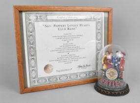 A Franklin Mint Limited Edition Beatles Sgt. Peppers Lonely Hearts Club Band Group under Glass Dome,