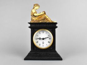 A Resin Mantel Clock in the Form of a Slate Clock of Architectural From with Top Finial of Classical