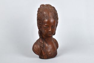 A Bronzed Resin Bust of an 18th Century Maiden, 23cms High