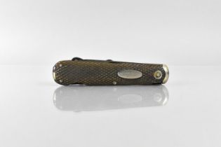 A Vintage Chequered Grip Handle Multi Tool Pocket Knife Having Blade, File, Saw, Corkscrew and