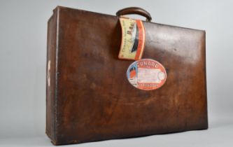 A Vintage Leather Travelling Case with Cunard Baggage Sticker and Tag for Cunard White Star to