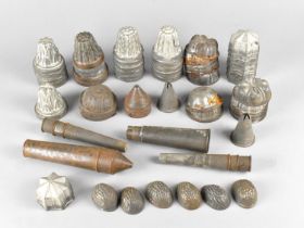 A Collection of Various Early 20th Century Tin Biscuit Moulds, Chocolate Moulds Etc to include
