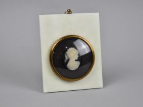 A Cameo Miniature, Pony Tailed Girl from the Miniature Work of Peter Bates, 10x12.5cms High