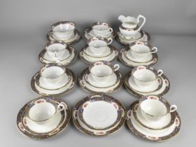 An Early/Mid 20th Century Aynsley Tea Set Decorated with Blue Paisley and Floral Inset Trim and Gilt