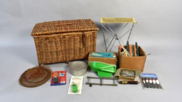 A Wicker Fishing Creel Containing Various Angling Equipment to include Landlines with Floats, Nets