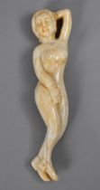 A Reproduction Oriental Carving of Nude Maiden in Recumbent Position, 12.5cms