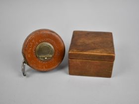 A Vintage Chesterman Leather Cased Tape Measure together with a Leather Cased Cigarette Box