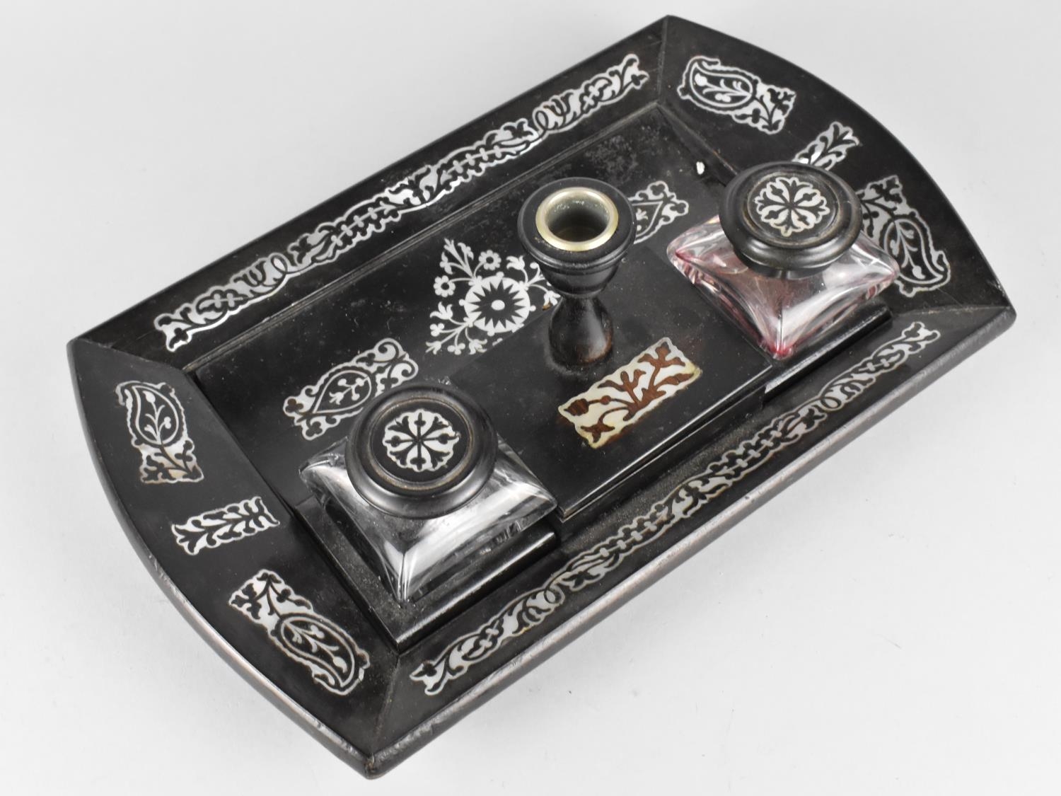 A 19th Century Regency Mother of Pearl Inlaid Ebonized Desk Top Inkstand with Grooved Pen Store, Two - Image 2 of 2