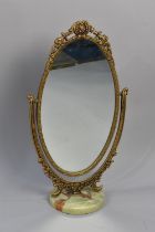 An Ornate Gilt Framed Dressing Table Mirror on Circular Marble Base, 64cms High