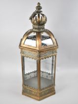 A Reproduction Hexagonal Bronzed Metal and Glazed Lantern, 63cms High