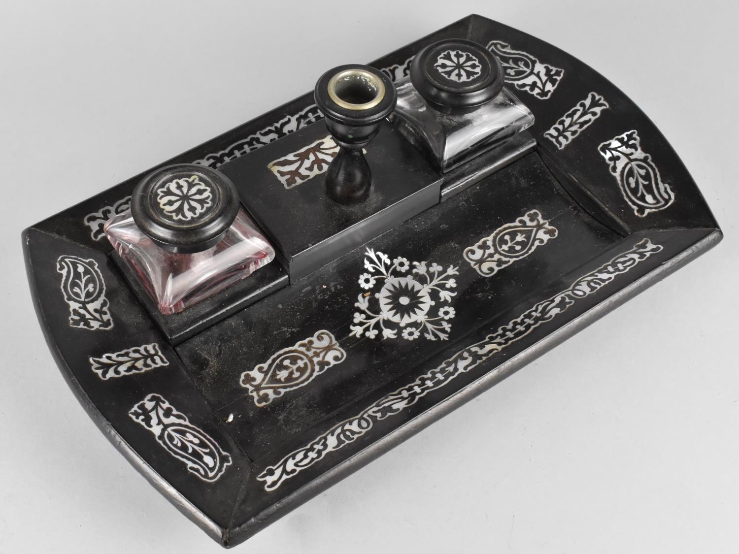 A 19th Century Regency Mother of Pearl Inlaid Ebonized Desk Top Inkstand with Grooved Pen Store, Two