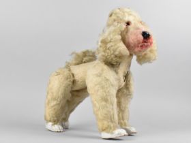 An Early/Mid 20th Century Musical Poodle, 24x28cms High
