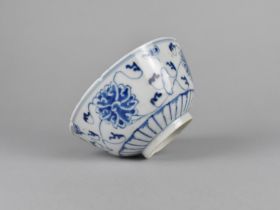 A Chinese Qing dynasty Porcelain Blue and White 'Lotus' Bowl with Four Character Mark to Base for