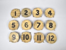 A Set of Twelve Vintage Tin Plate Painted Clock Golf Markers, 1-12, 8cms Diameter
