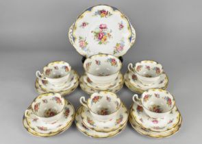 An Adderley Floral Decorated Tea Set (Pattern no. H436) to Comprise Five Cups, Six Saucers, Six Side