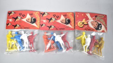 A Collection of Three Unopened and Sealed Bagged Plastic Figures of The Beatles, 'Beatlemania' By