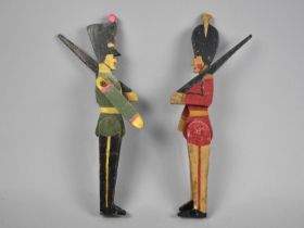 A Pair of Early 20th Century Fret Cut Wooden Soldier Toys, 27cms High