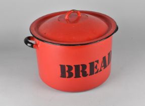 A Mid 20th Century Red Enamelled Lidded Bread Bin, 29cms Diameter