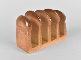 A Carlton Ware Novelty Toast Rack in the Form of a Hovis Loaf of Bread