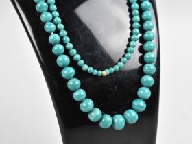 A Malachite Necklace with Circular Graduated Beads