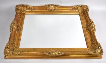 A Modern Gilt Framed Rectangular Wall Mirror, 62x52cms